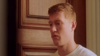 Charlie, the milf of an office manager, sat on her desk while her horny assistant, Troy, stood in front of her