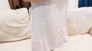 This little babe is on her knees in front of me, taking off my pants