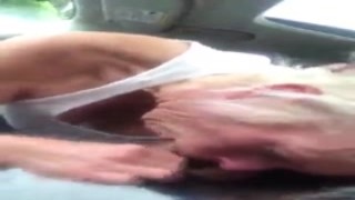 MILF stepmom performs oral sex on my BBC while nobody's watching in the front seat