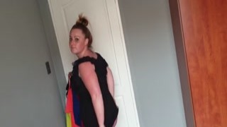 The fat girl's jiggling tits pressed against the satin fabric of the red dress as she slithered her body into it