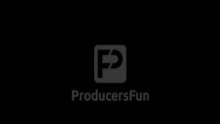 The hot blonde with the massive tits was on her knees in front of me, eagerly sucking my cock